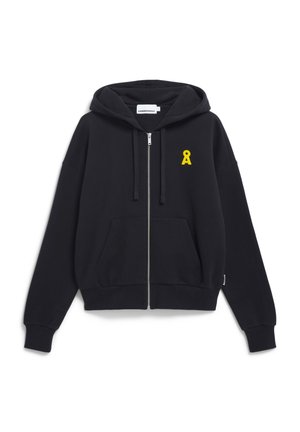 Black zip-up hoodie made of soft fabric. Features a front pocket, drawstring hood, and a small yellow ribbon logo on the left chest.