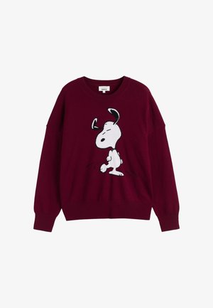 Pull en tricot bordeaux à coupe décontractée, mettant en avant un motif Snoopy noir et blanc sur le devant. Couples et ourlet côtelés.