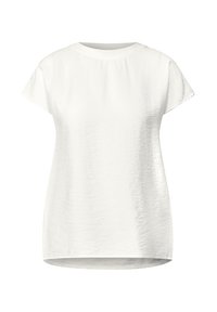 T-shirt blanc à manches courtes avec un col rond, présentant un tissu légèrement texturé et un ourlet courbé, offrant une silhouette allongée.