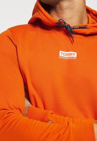Tommy Jeans Jersey con capucha - orange