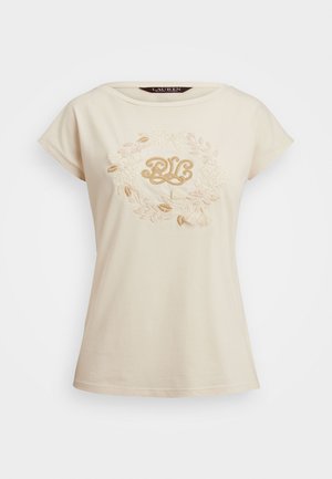 Beige lühikeste varrukatega T-särk, millel on kullatoonides lilleline tikand ja stiliseeritud "RL" logo keskel. Pehme puuvillane materjal.