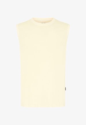 Beige, ermeløs strikkegenser med rund hals og en liten svart merkelapp på den nedre sidesømmen.