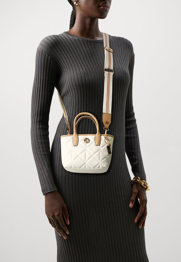 DALLOBASSI - Handbag - beige overflow