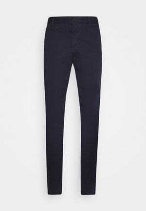 Marineblauwe slim-fit broek met knoop- en ritssluiting, riemlussen en zonder zichtbare zakken, getoond op een witte achtergrond.