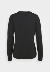 T-shirt in cotone nero a maniche lunghe con scollo a girocollo e orlo dritto. Tessuto liscio senza pattern o dettagli visibili.