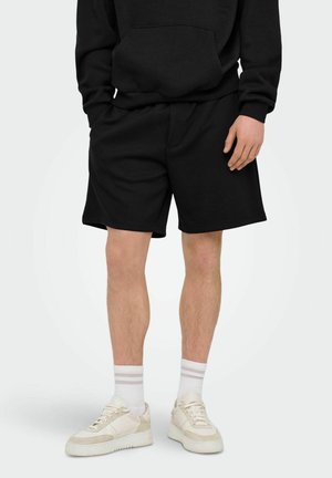 LÄSSIGE  ONSLUCA LOCKER GESCHNITTEN  - Trainingsbroek - black