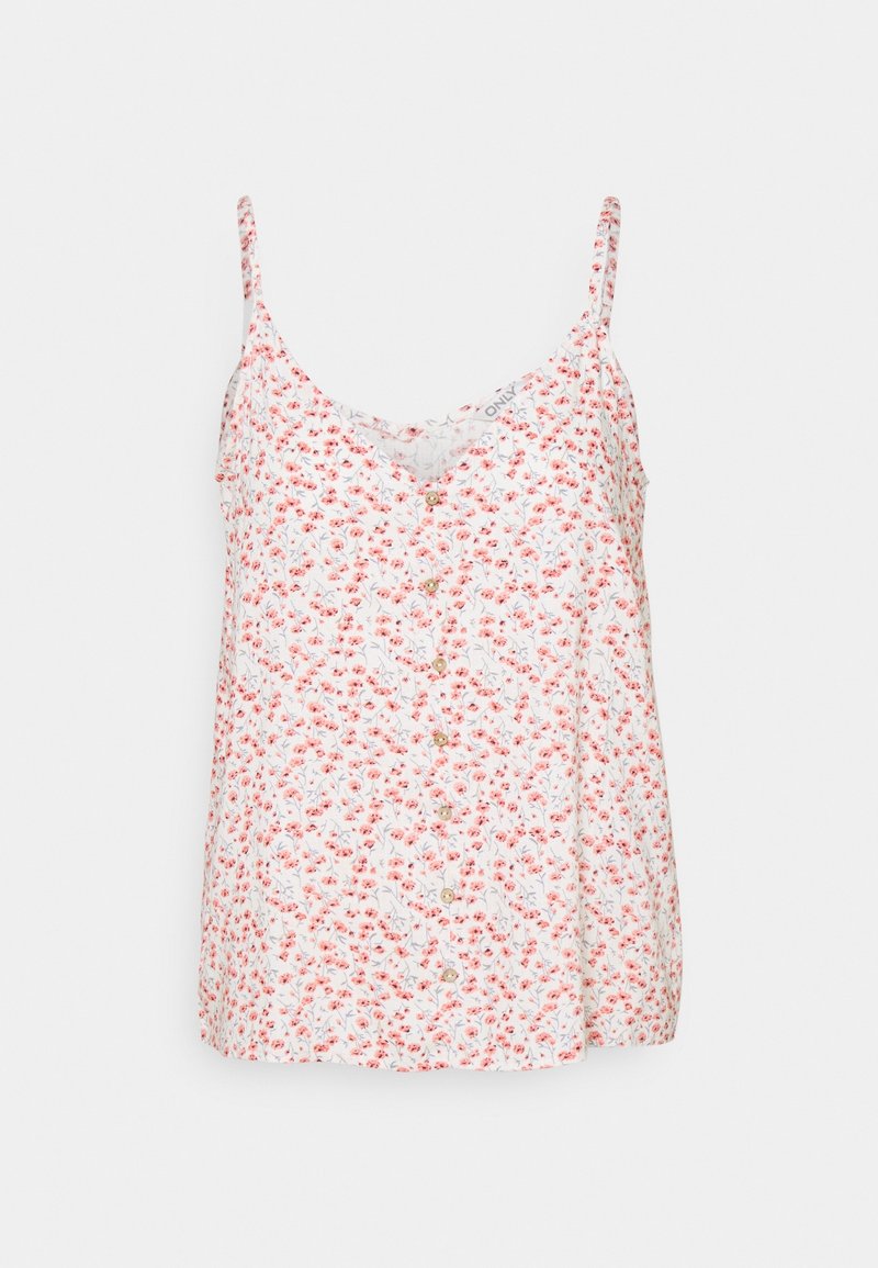 Haut blanc sans manches avec fines bretelles, présentant un petit imprimé floral rouge et une rangée avant de boutons beige.