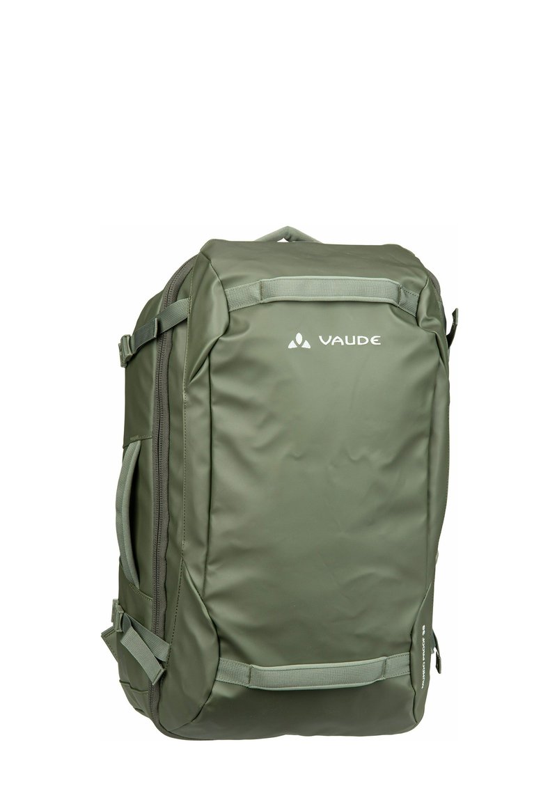 Sac à dos vert olive en matériau imperméable, de forme rectangulaire, doté de plusieurs zips, de bretelles réglables et d'un logo à l'avant.