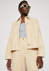 HUGO ANDERI - Jeansjacke - open beige