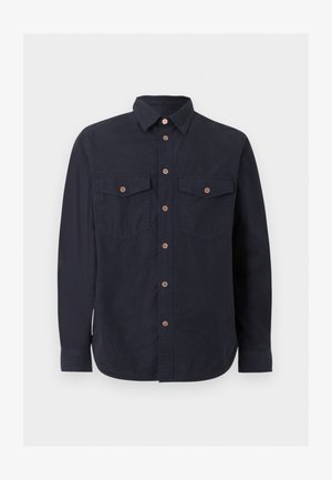 Long-sleeve navy blue button-up shirt with collar and two buttoned chest pockets against a plain background.
