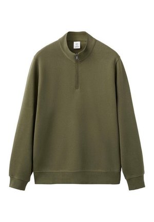 Oliivinvihreä svetari, jossa pehmeä pinta, korkea kaulus ja puolivetoketju. Varustettu resorihihoilla ja -helmalla mukavan istuvuuden takaamiseksi.