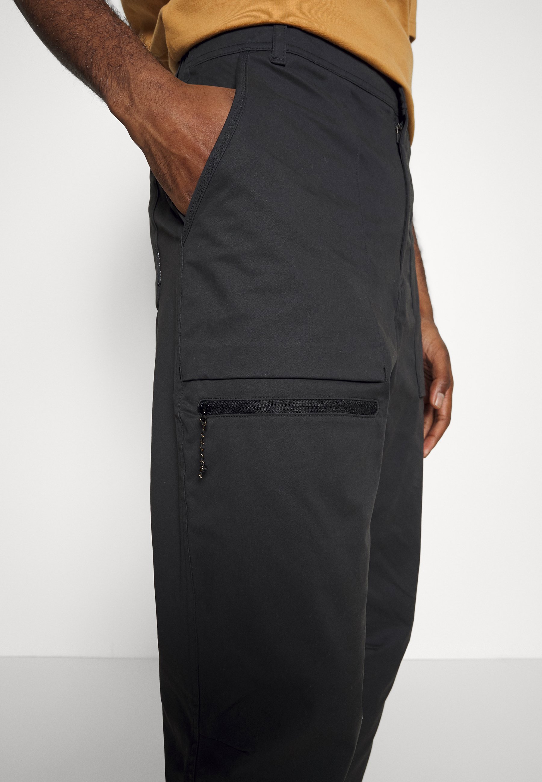 New Balance ALL TERRAIN WOVEN PANT - Broek - black/zwart - Zalando.nl