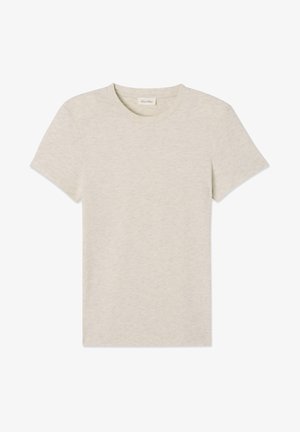 Gai bēšs īsroku t-krekls, kas izgatavots no mīksta auduma, ar klasisku apļa kakla izgriezumu un gludu tekstūru ar minimāli redzamām šuvēm.