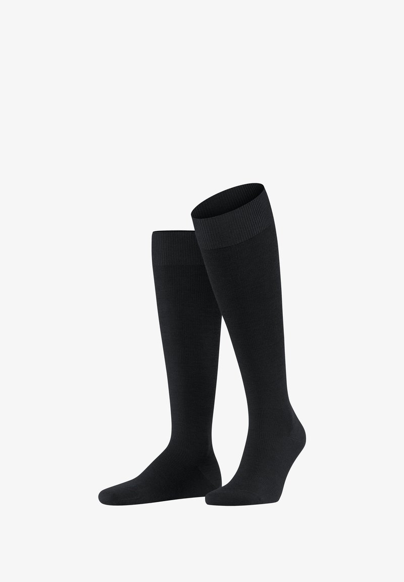 Knielange schwarze Socken aus glattem Stoff mit gerippten Bündchen, die ein klassisches Design und eine einfarbige Ausführung ohne Muster oder Akzente aufweisen.