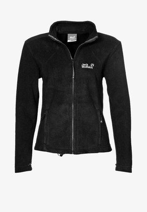 Veste polaire noire à fermeture éclair intégrale avec col montant, manches longues, poches latérales et logo "Jack Wolfskin" sur le côté gauche de la poitrine.