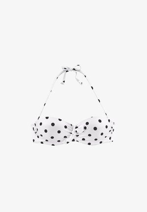 Tirante de bikini blanco con lunares negros, que presenta un detalle de nudo en la parte frontal y tirantes halter ajustables. Textura de tela suave.