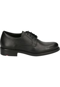 Scarpa elegante in pelle nera con punta arrotondata, tomaia texturizzata e chiusura con lacci. Presenta un tacco basso e dettagli di cucitura discreti.