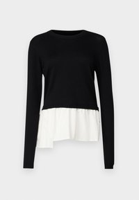 Czarna bluzka z długim rękawem o luźnym kroju, z białym falbanym dołem. Wykonana z mieszanki materiałów z prążkowanym dekoltem i mankietami.