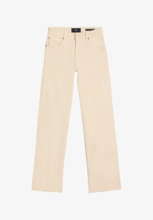 Jean beige à jambes larges avec un design classique à cinq poches, des accessoires en métal et un tissu doux et texturé. Bords nets et ajustés.