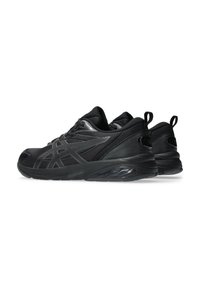 Black running shoes with a textured mesh upper, synthetic accents, and a cushioned sole. Features a prominent brand logo on the side.