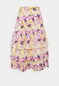 Monivärinen kerroksellinen hame, jossa on keltainen, vaaleanpunainen ja violetti kukkakuosi. Valmistettu kevyestä kankaasta, jossa on röyhelöreuna ja joustava vyötärö.