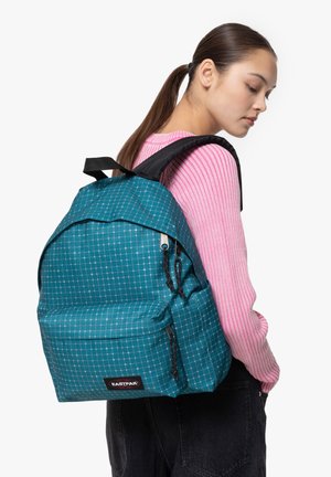 Teal checkered fabric backpack with a front zip pocket, black straps, and Eastpak logo. Soft texture, rounded shape, casual design.