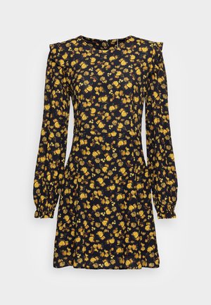 Sort langærmet kjole med gult blomsterprint, tilpasset talje, puffede skuldre og elastiske manchetter.