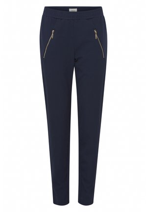 Pantalones azul marino con cinturilla elástica, que presentan dos bolsillos con cremallera en la parte delantera y un diseño de pierna ajustada. Textura de tela suave.