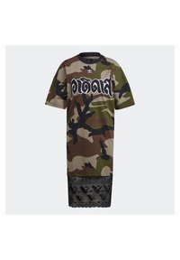 Camo-patterned oversized t-shirt with black lace hem, round neckline, and short sleeves. Features bold graphic text in white.