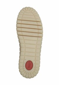 Semelle de chaussure en caoutchouc, couleur crème, texturée avec des rainures horizontales et verticales, présentant un accent central rouge avec le mot "CONFORT" embossé.