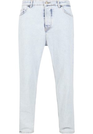 Vaaleansiniset farkut slim fit -mallissa, viisi taskua ja vetoketjukiinnitys. Haalistunut pesu, jossa on hienovaraiset kulutustekstuurit ja ompeluyksityiskohdat.