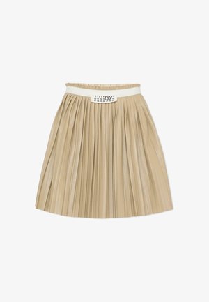 Jupe plissée en matériau beige avec une finition texturée. Elle comporte une ceinture élastique blanche et une étiquette avec des tailles numériques à l'avant.