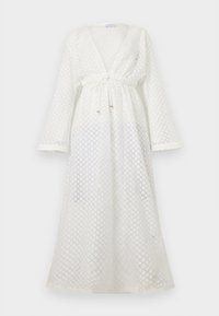 Λευκό μακρύ φόρεμα με μακριά μανίκια, V-λαιμόκοψη, διάφανο ύφασμα με διαμαντένιο μοτίβο και ρυθμιζόμενη ζώνη στη μέση με μικρές χρυσές χάντρες ως διακοσμητικά.