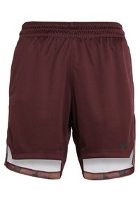 Bordeauxfarbene Sportshorts mit elastischem Bund, seitlichen Mesh-Einsätzen und dezentem Logo. Strukturierter Stoff, knielanges Design.