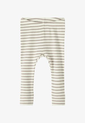 Triibulised retuusid, millel on pehme ja veniv kangas kreemjas toonis koos heledate pruunide horisontaalsete triipudega, mis on varustatud elastse vöökoht ja ümarate õmblustega.