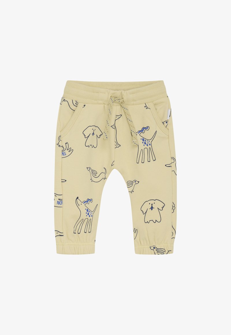 Pantalons beige pour tout-petits avec des poignets et une taille élastiques, poches avant, cordon de serrage, et imprimés de gribouillis de chien et de lapin en bleu et noir.
