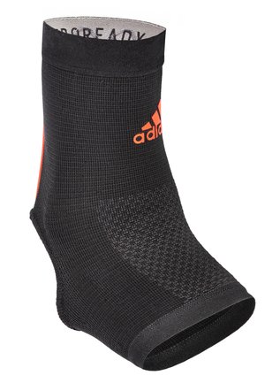 Schwarze Sportsocke aus strukturiertem Stoff, mittelhoch bis zur Wade, mit einem orangefarbenen Logo und Akzenten. Glatter Knöchelöffnung für zusätzlichen Komfort.