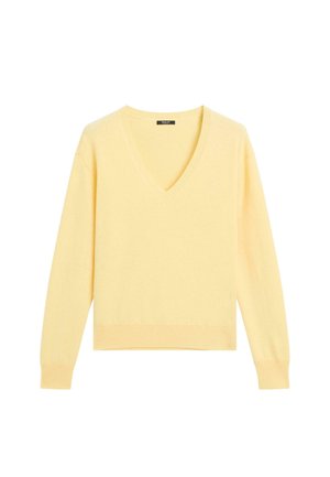 Pull à col en V en tissu tricoté jaune doux, doté de manches longues et d'un ourlet côtelé. Conception simple avec une coupe décontractée.