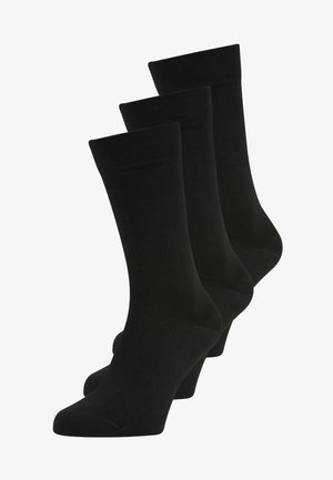 Zwarte sokken in een verpakking van drie, gemaakt van een gladde, rekbare stof. Ze hebben een ribbelmanchet en een standaard lengte met een eenvoudige ontwerp.