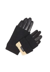 Gants en tricot noir à côtes avec bouts en cuir. Présentant un poignet beige avec une étiquette de logo. La texture lisse contraste avec le tissu côtelé.