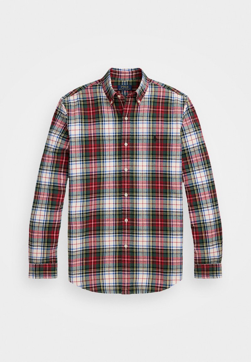 Chemise à manches longues boutonnée avec motif à carreaux rouge, vert, blanc et bleu et col boutonné sur fond blanc.