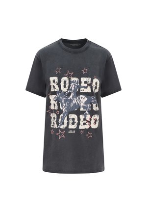 Black t-shirt with distressed "RODEO" text, graphic of a rodeo rider on a bucking horse, and scattered red stars on the front.