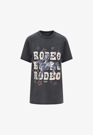Black t-shirt with distressed "RODEO" text, graphic of a rodeo rider on a bucking horse, and scattered red stars on the front.