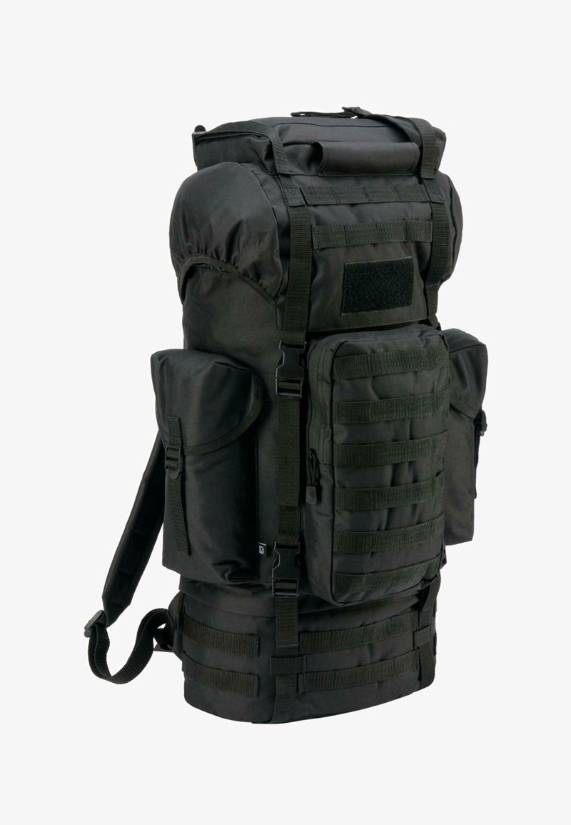 Sac à dos tactique noir avec plusieurs poches, sangles réglables et système MOLLE. Fabriqué à partir d'un tissu durable, avec une fermeture enroulable.