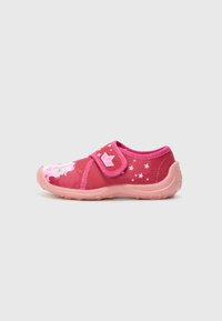 Pink children’s shoe with a velcro strap, featuring cloud and star patterns, and a textured rubber sole for grip. Casual design.