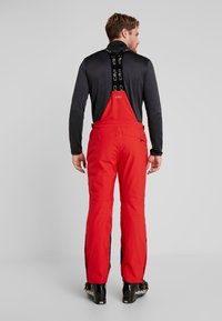 CMP MAN SALOPETTE Pantalons de ski ferrari/rouge Zalando