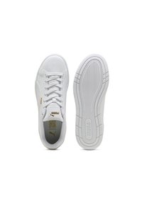 White sneakers with a smooth synthetic upper, flat laces, gold logo accents, and a textured rubber sole featuring a zigzag pattern.