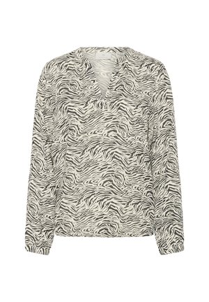 Long-sleeve V-neck blouse with black and white zebra print pattern and slightly gathered cuffs.