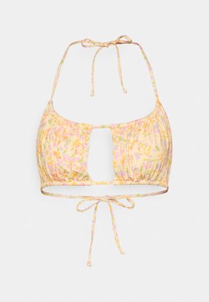 Halter bikini top met pastel bloemenpatroon, centrale snit aan de voorkant en verstelbare strikken in de nek en op de rug.
