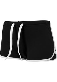 Černé sportovní šortky s šňůrkou v pase, s bílým prošíváním a lemem podél okrajů. Vyrobeno z měkké, pružné tkaniny.